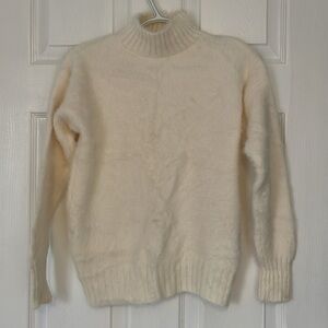 White fuzzy sweater